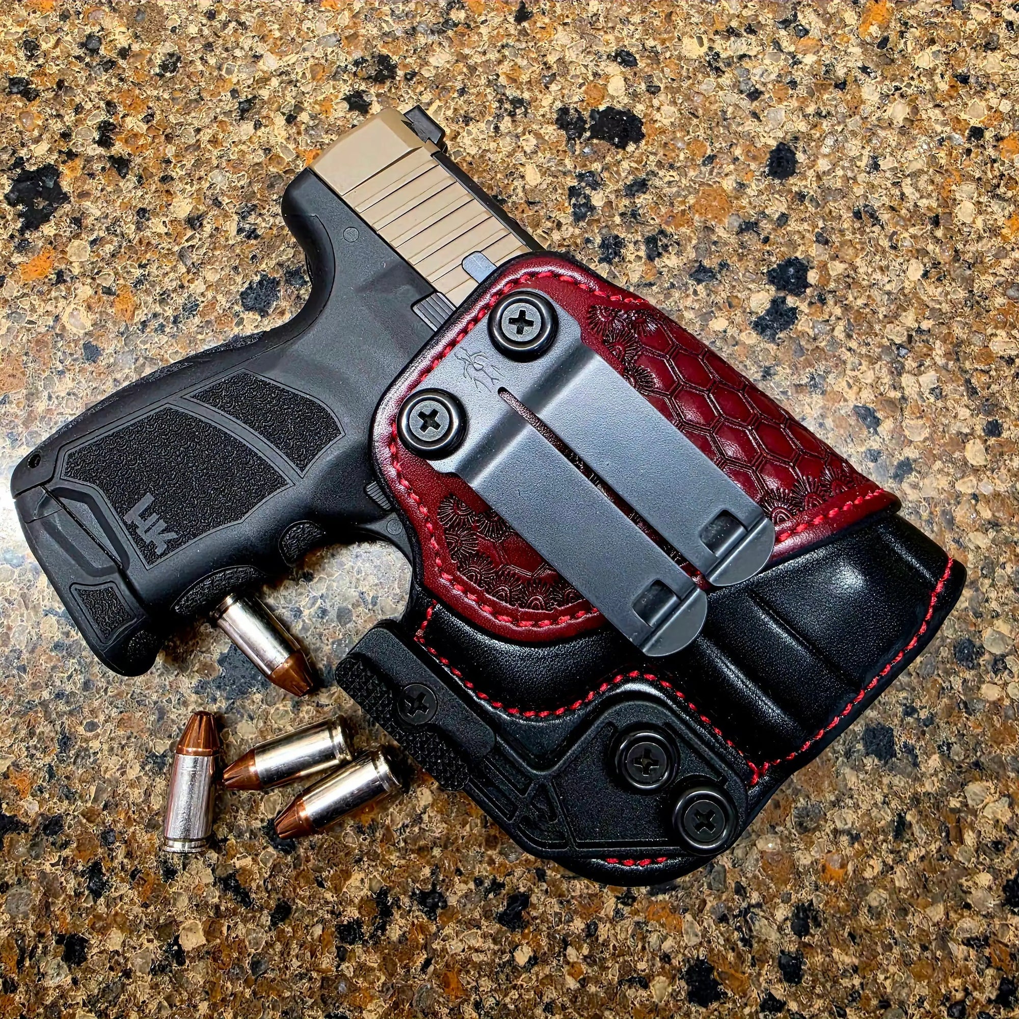 HK CC9 seated in a handmade leather Insider IWB holster, the author's everyday carry rig