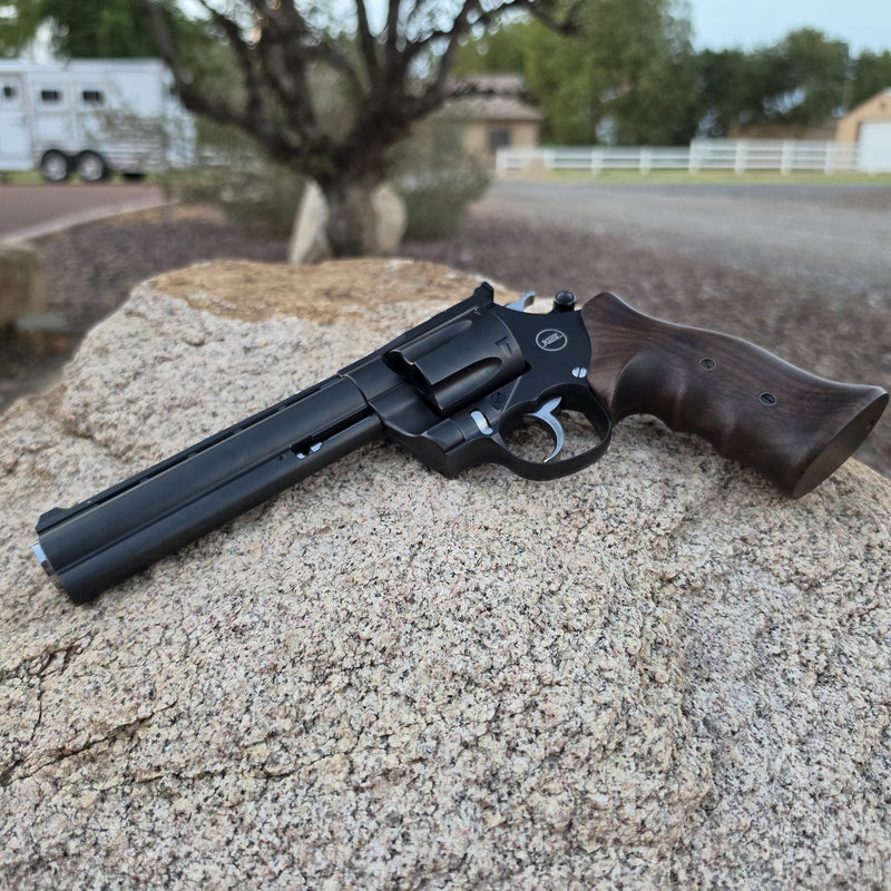 Korth Mongoose .44 Magnum with a 6 inch barrel, resting on a granite boulder in the Arizona desert